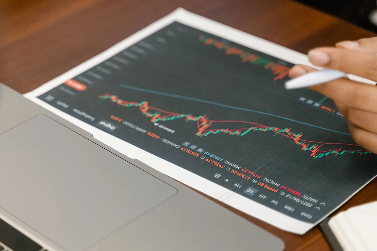Business analysis printouts with charts on a table